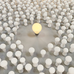 Concept of the emergence of ideas in the community.  Light bulb surrounded by people. 3d illustration.