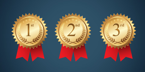 a set of winning medal badge with red ribbon