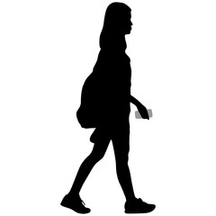 girl with backpack in sneakers with phone