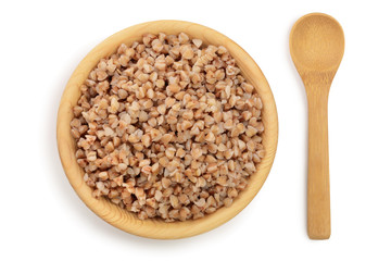Buckwheat porridge in wooden bowl isolated on white background. Top view