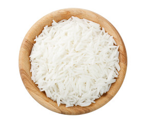 rice in a wooden bowl isolated on white background. Top view. Flat lay