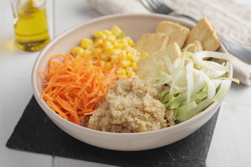 Buddha bowl with quinoa, tofu, and vegetables