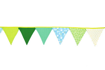 Cute garland of colorful flags. Decorations of colorful pennants. Green, blue cotton fabric party flags. Flag line isolated on white background. Front view,
