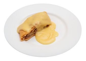A piece of delicious apple strudel with sweet sauce on white plate