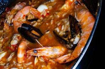 Seafood paella with prawns and mussels