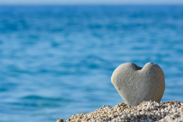 Heart shaped stone on a beach