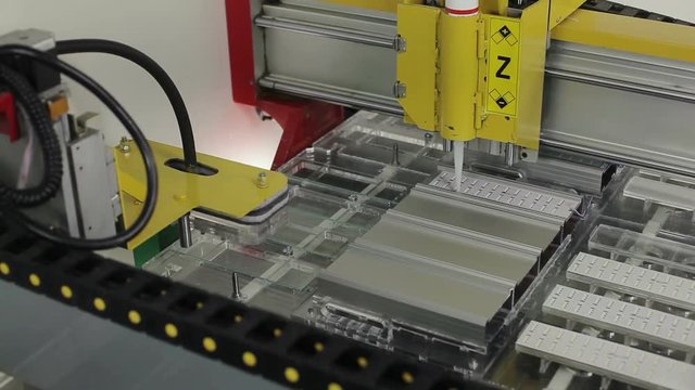 The modern machine glues the led Board on the lamp body