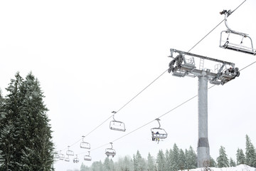 Ski lift at mountain resort. Winter vacation
