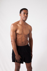 Fototapeta na wymiar Handsome strong black man with shirt off