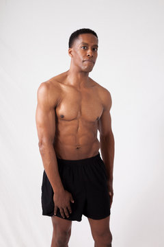 Handsome strong black man with shirt off