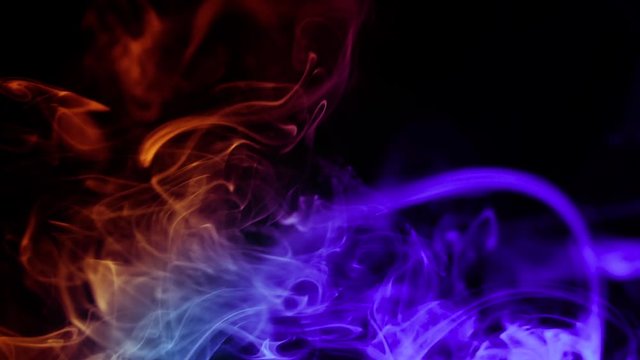 Abstract colorful smoke on black background,
