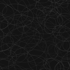 Abstract seamless pattern of randomly arranged contours of ellipses in black and gray colors