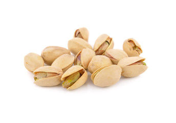 dried pistachios on white background