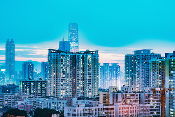 Exterior of the apartment buildings at sunset time. Shenzhen. China.