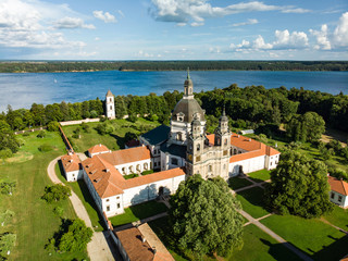 Aerial view of Pazaislis Monastery and Church, the largest monastery complex in Lithuania, located on a peninsula in Kaunas Reservoir. - obrazy, fototapety, plakaty