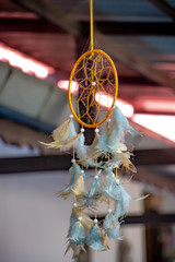 Dreamcatcher hanging with the roof. Ojibwa Chippewa's sacred Hoop. It was traditionally used to...