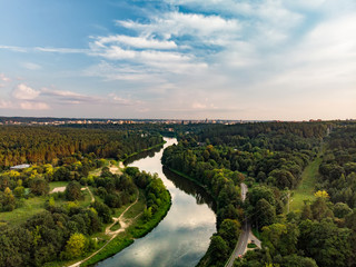 Beautiful aerial landscape of Neris river winding through Vilnius city.