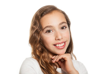 Beautiful young girl thinking or having an idea isolated on white background