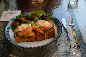 Salmon Eggs Benedict with Alcoholic Drink