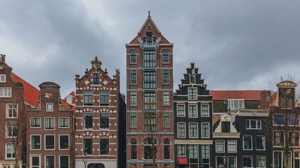 Fototapeta premium Facade of houses in downtown Amsterdam, the Netherlands