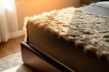 Synthetic carpet on the laminate in the home interior. Close-up