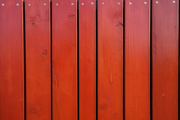 Vintage red boards, great design for any purposes. Dark wooden texture. Interior decoration. Space texture.