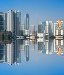Reflection photography of business building and shopping mall center in financial district of Thailand.