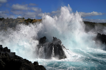 waves crashing on rocks from the ocean