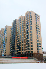 Tall buildings in the snow