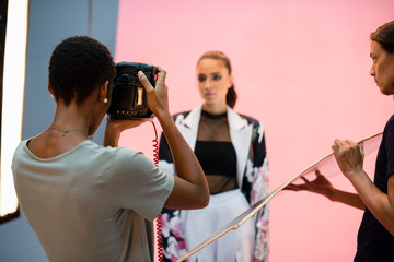 Young model posing for the camera in a studio