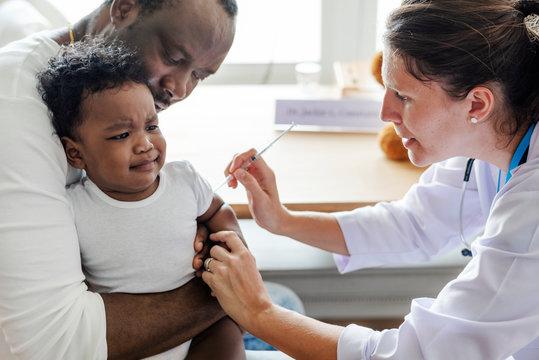 Baby getting a first injection