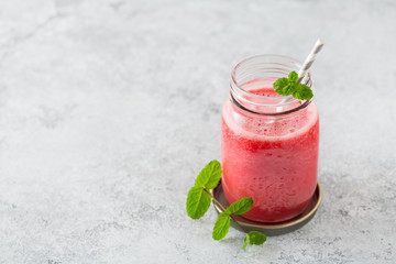 Watermelon smoothies in glass jars