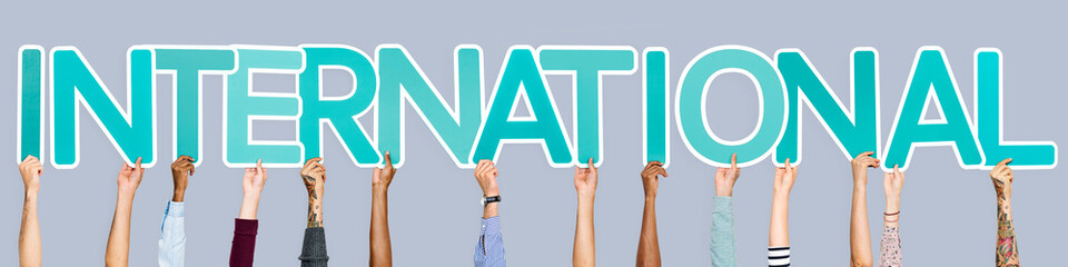 Fototapeta premium Blue letters forming the word international