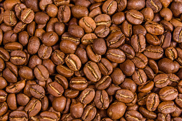 Background of many roasted coffee beans