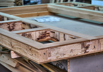 Fototapeta na wymiar Wood door manufacturing process. Door frame. Furniture manufacture.
