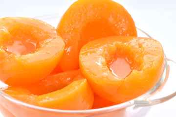 Canned peach isolated on a white background 