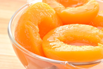 Fototapeta na wymiar Canned peach isolated on a white background 
