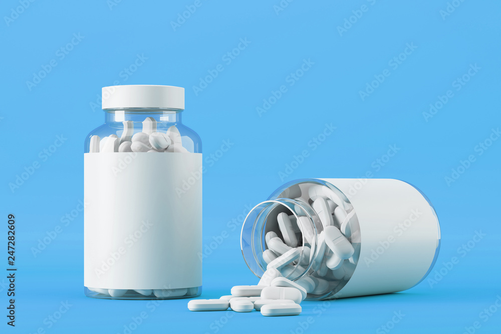 Poster glass jar with vitamins on blue background. packaging from under tablets with scattered pills. mock 