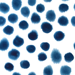 Randomly hand painted indigo blue polka dots. Seamless watercolor pattern