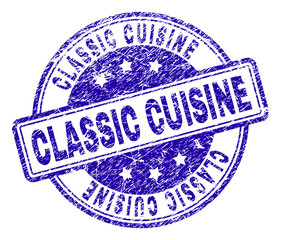 CLASSIC CUISINE stamp seal watermark with distress texture. Designed with rounded rectangles and circles. Blue vector rubber print of CLASSIC CUISINE text with grunge texture.