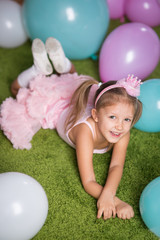 Fototapeta na wymiar Girl child with balloons