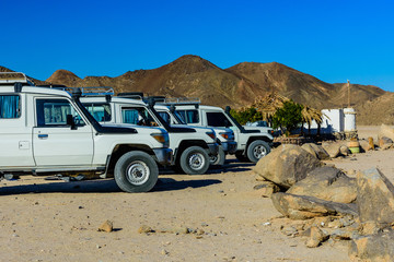 White SUVs in Arabian desert not far from the Hurghada city, Egypt