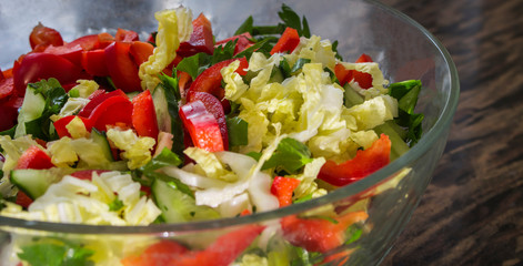 glass salad bowl with vegetable salad