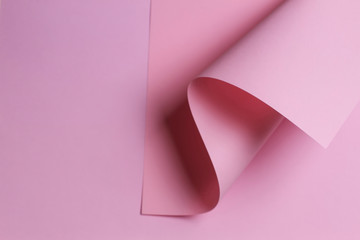 Abstract colorful background. Pastel pink paper in geometric shape
