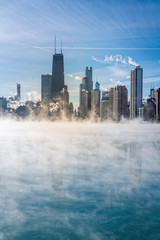 Downtown Chicago with winter fog on Lake Michigan. Polar vortex