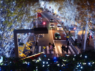 Roppongi Tokyo,Japan/Dec 18,2018:christmas illumination looking down Keyaki street with miniature...