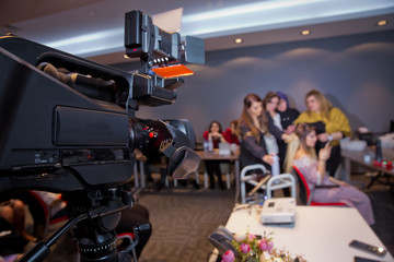 In front of the camera to recording vlog video live streaming at home.Business online influencer on social media concept. Makeup cosmetic at home. Focus on tripod mounted camera screen showing .