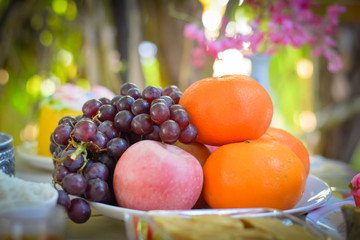 Group of fruits orange, apple and red grape. Healthy food for loose weight.