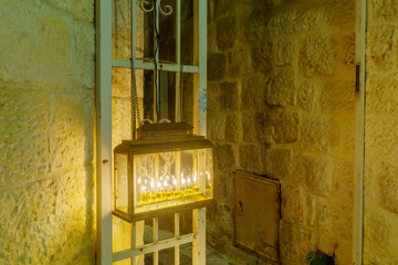 Traditional Menorah (Hanukkah Lamp), with olive oil candles, Jerusalem