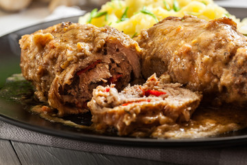 Pork rolls in sauce